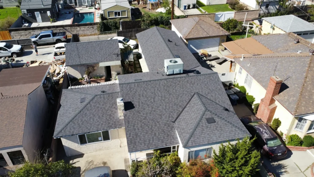 Crew recoating a flat roof on a Playa Vista townhome building for the HOA
